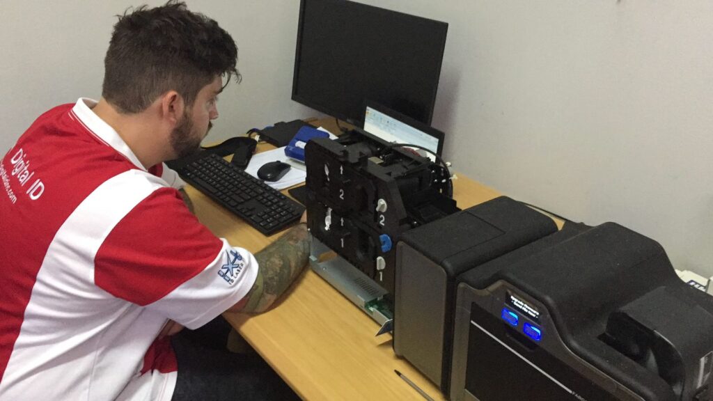 echnician from Digital ID Technologies fixing a card printer at UNDP in Mozambique.